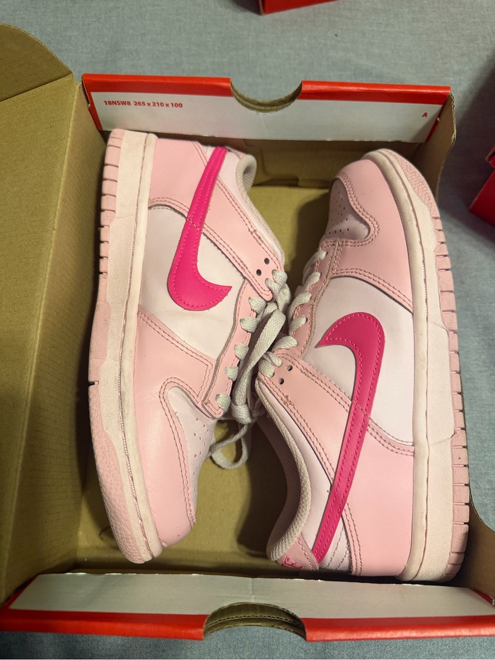 Nike Women's Light Pink Low-Top Sneakers with Hot Pink Swoosh